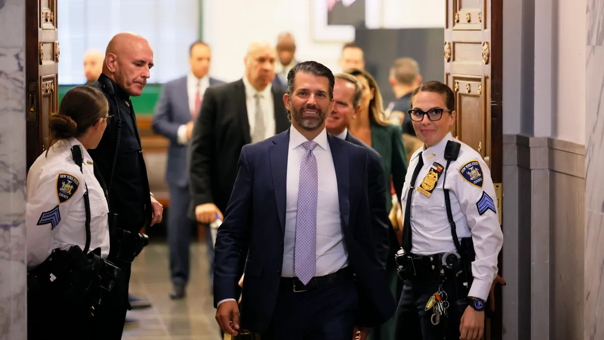 Donald Trump Jr. exiting courtroom