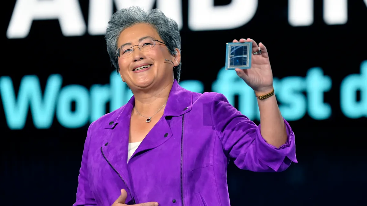 AMD Chair and CEO Dr. Lisa Su displays an ADM Instinct M1300 chip as she delivers a keynote address at CES 2023 at The Venetian Las Vegas on January 04, 2023 in Las Vegas, Nevada.