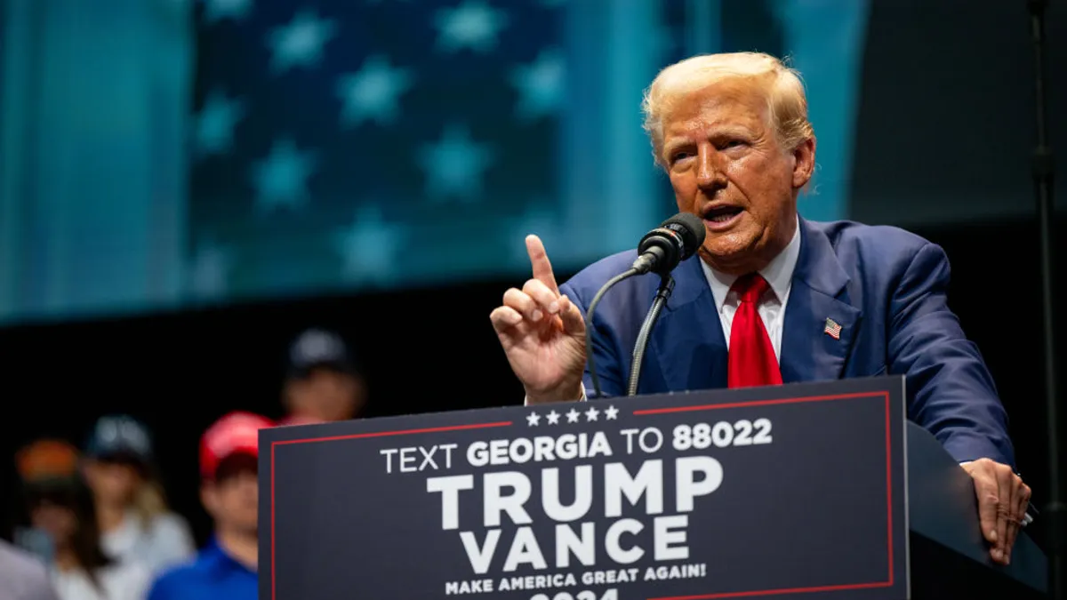 Republican presidential nominee former U.S. President Donald Trump speaks at a campaign rally at the Johnny Mercer Theatre on September 24, 2024 in Savannah, Georgia.