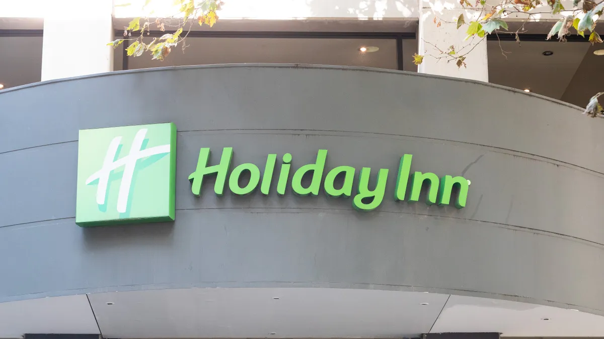 A closeup of the Holiday Inn logo on a building.