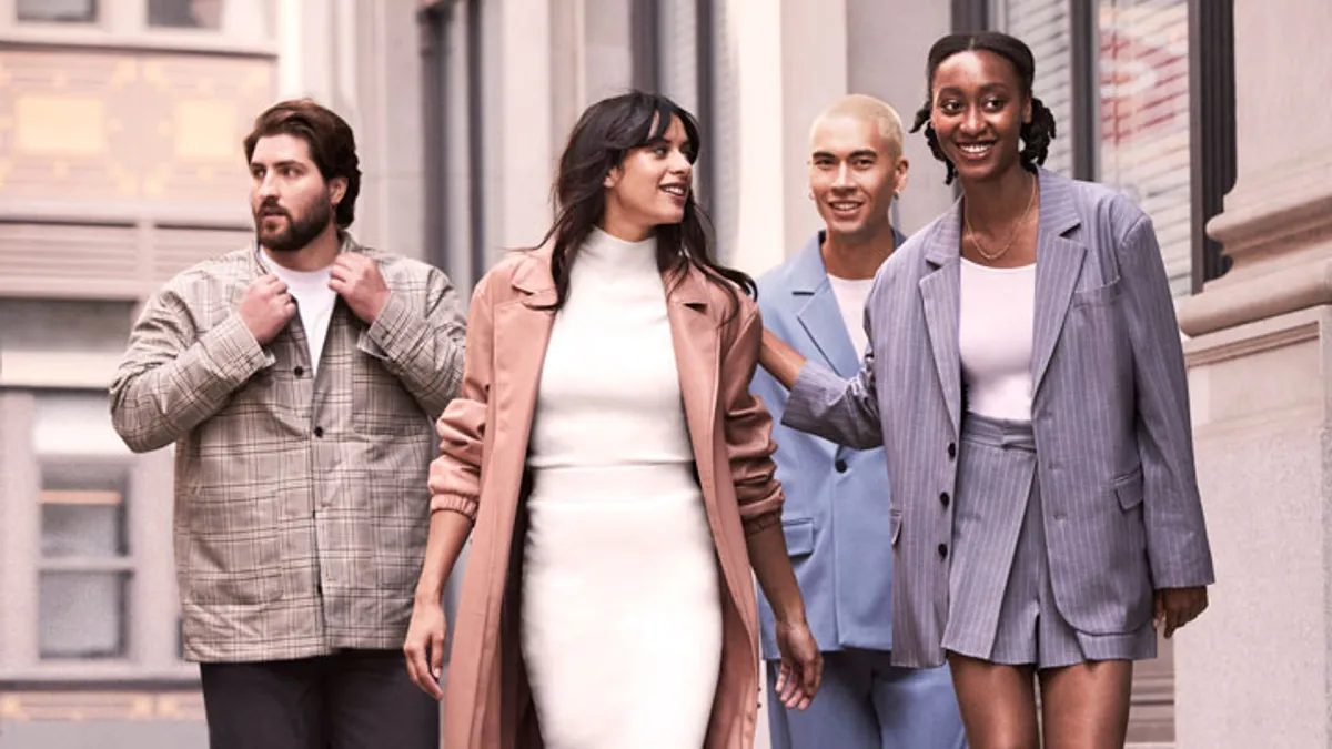 A group of people wearing a J.C. Penney collection by Jason Bolden.