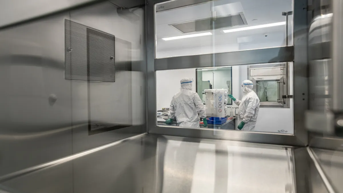 Employees at a Takeda cell therapy facility