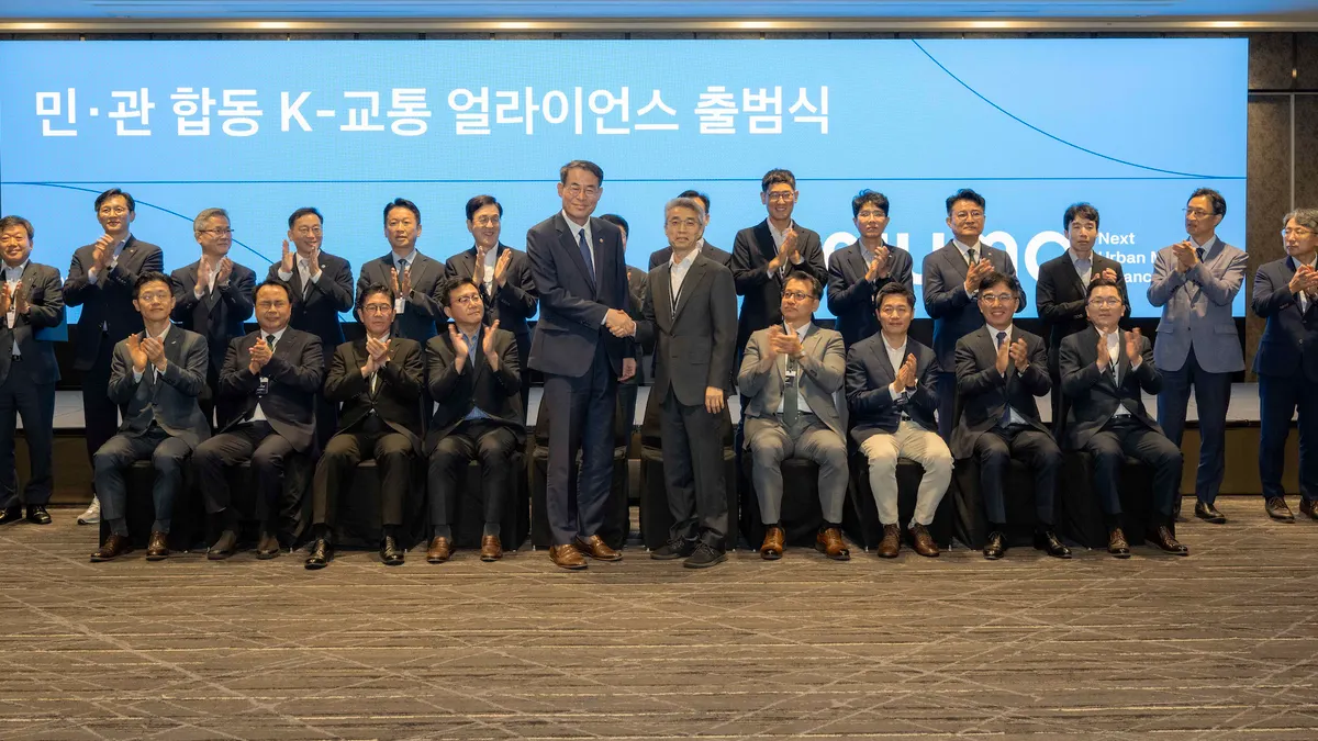 Several dozen stakeholders pose for a photo in Seoul on Sept. 1, to mark the official launch of Hyundai's Next Urban Mobility Alliance.