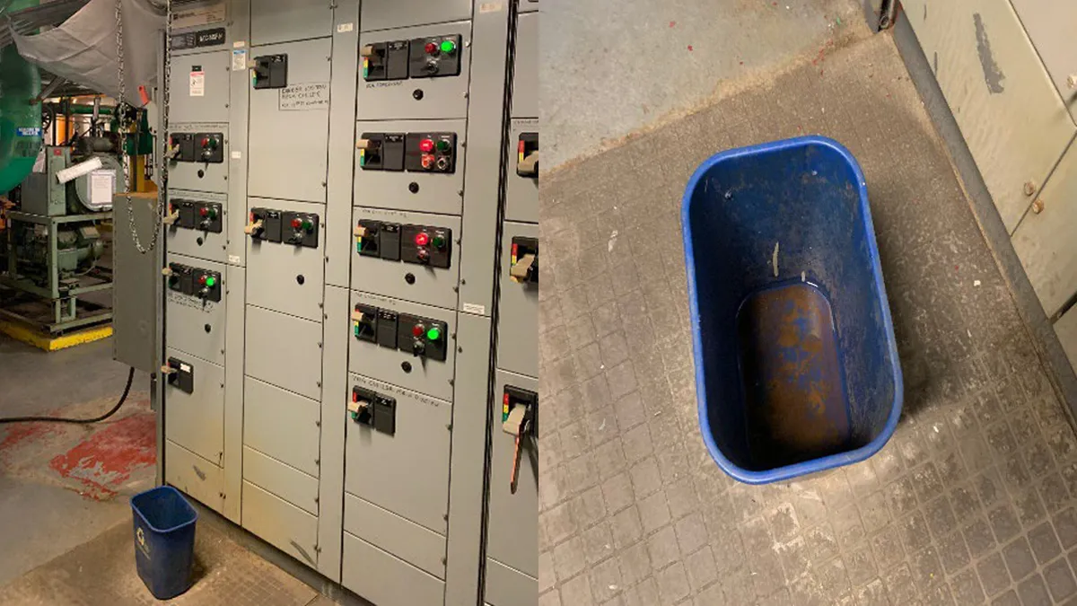 A blue recycling bin is positioned to collect water from a leaking valve above the motor control center in the Jacob J. Javits Federal Building in New York City in January 2023.