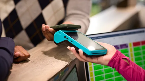 Customer making contactless payment
