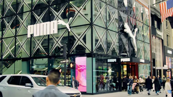 An athletic store on a New York City corner.