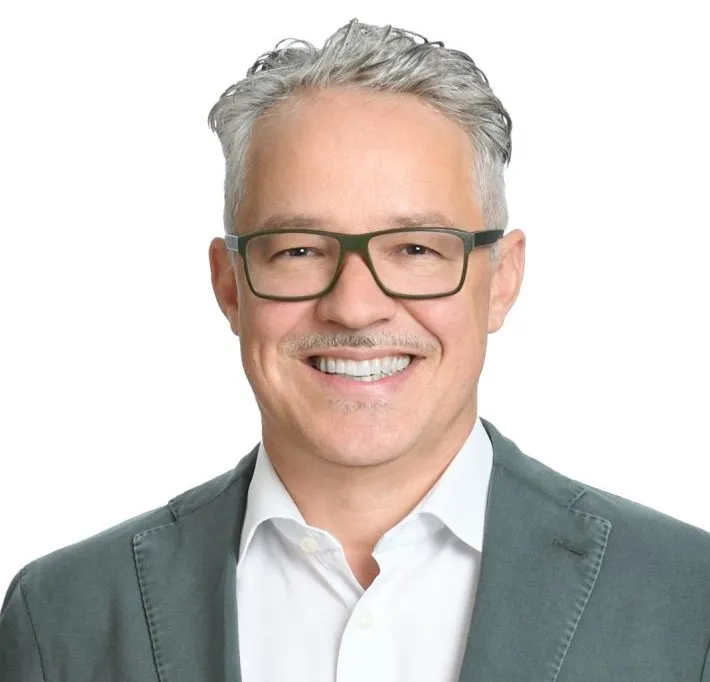 A headshot of Roland Rott, GE Healthcare&#x27;s CEO of imaging