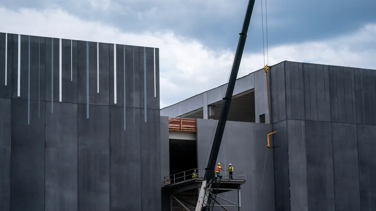 A construction crew works on a CloudHQ data center on July 17, 2024 in Ashburn, Virginia.