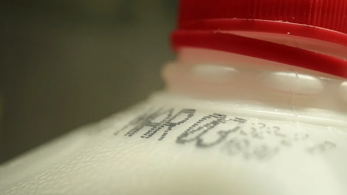 Close up of date on plastic milk jug