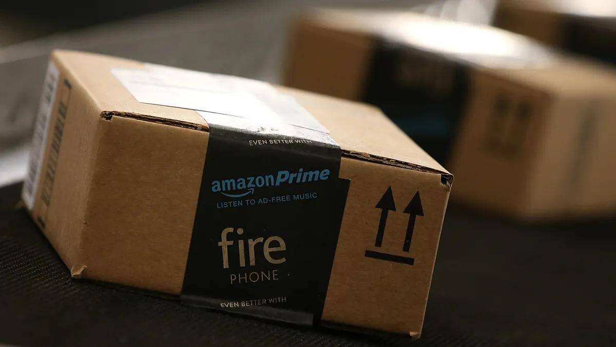 Boxes move along a conveyor belt at an Amazon fulfillment center.