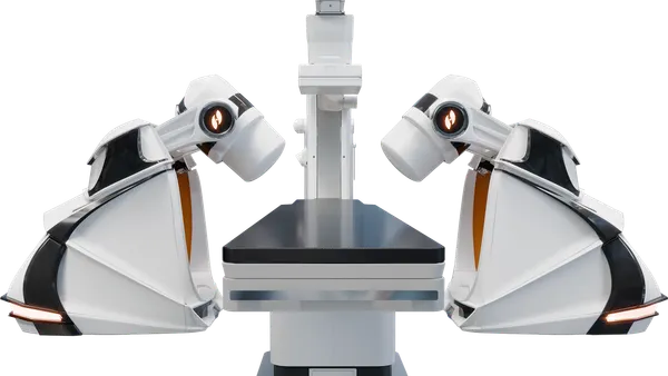 Stereotaxis' GenesisX surgical robot is shown against a white background.