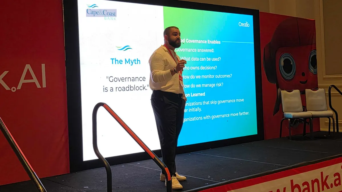 an executive speaks during a conference
