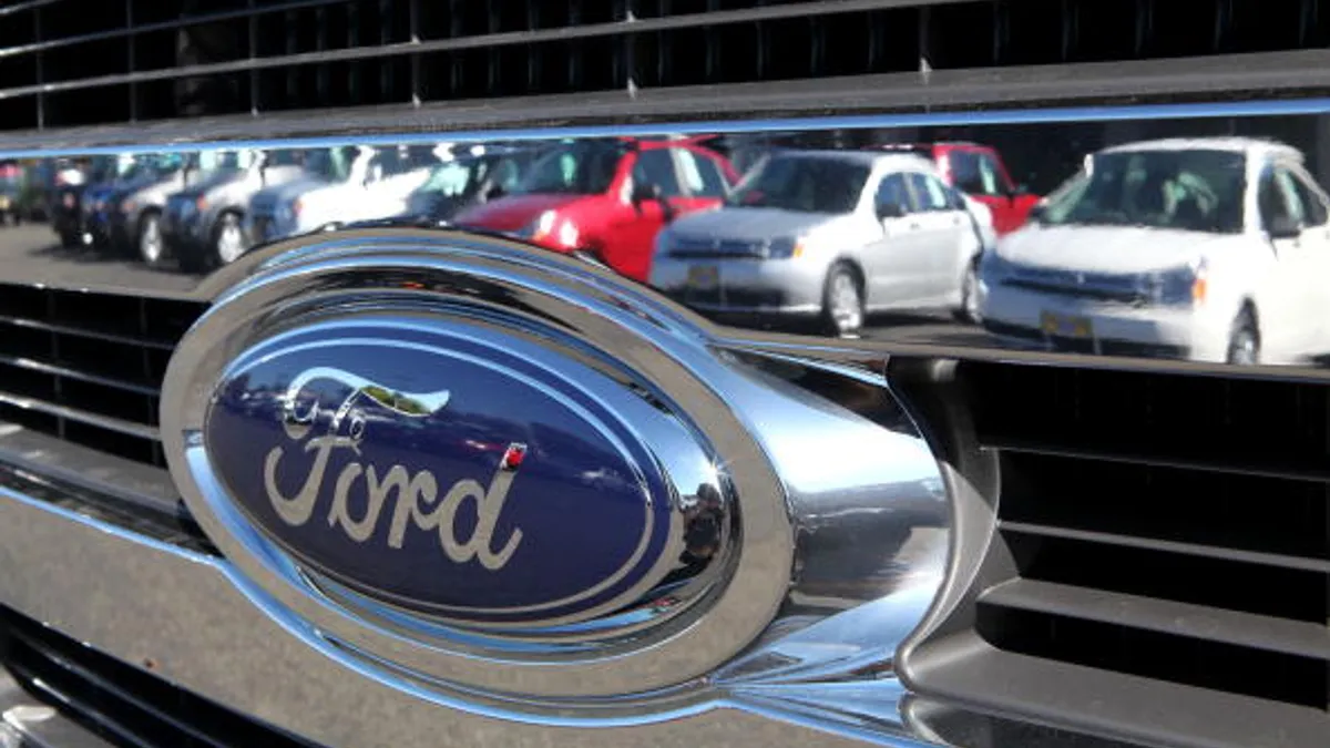 A picture of the Ford logo on a car