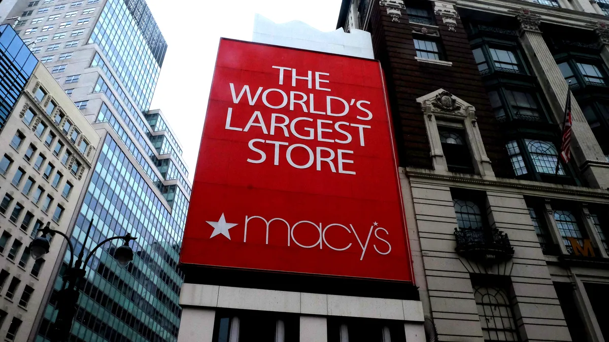 A big red sign says that Macy's is "the world's largest store."