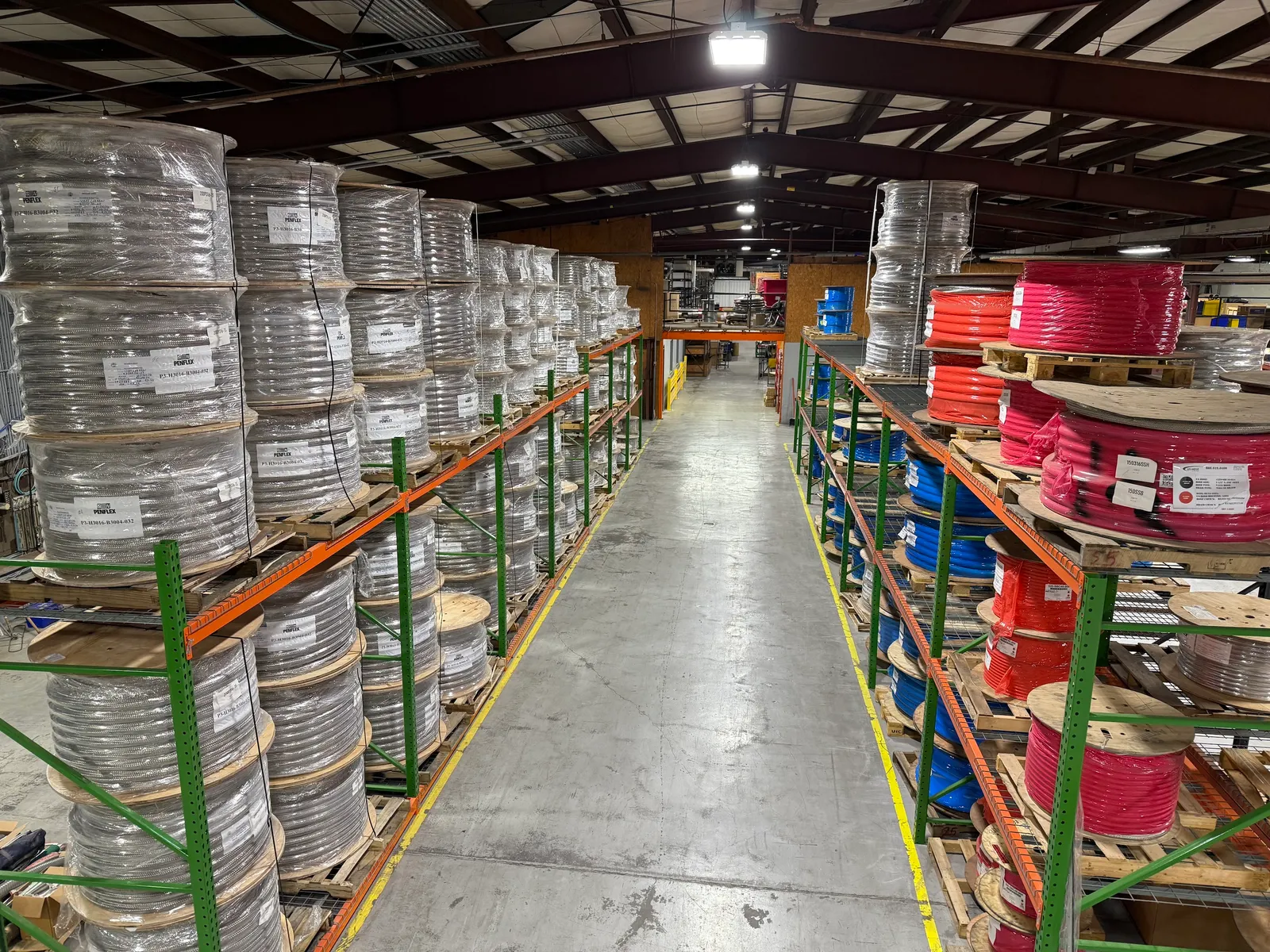Racks of corrugated metal hoses at a facility in Georgia