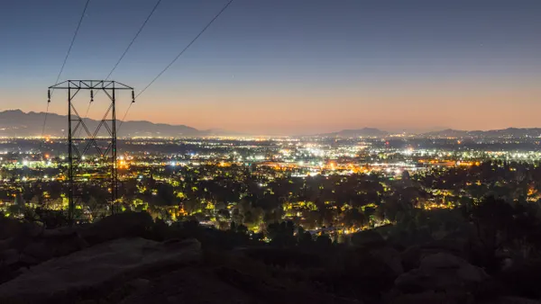 Los Angeles predawn mountain view of power lines entering the San Fernando Valley. The San Gabriel Mountains are in background.