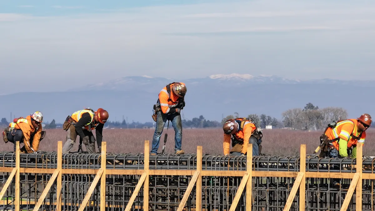 Construction site of concrete overpass.