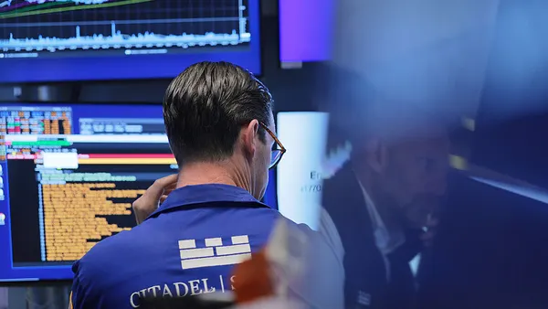 Traders work on the floor of the New York Stock Exchange during morning trading on June 04, 2026 in New York City. Stocks opened mixed, with the S&P 500 and Nasdaq falling while the Dow Jones Industrial Average rose more than 500 points after dropping 600 points at the previous day's close. (