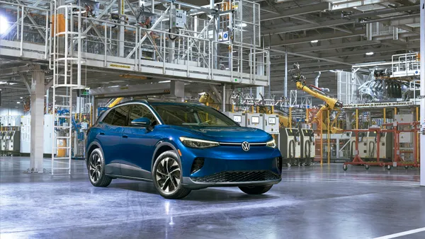 A blue ID.4 electric SUV shown inside Volkswagen Chattanooga Operations plant in Tennessee.