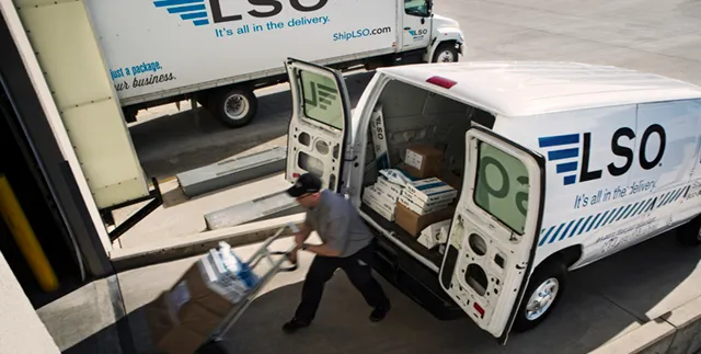 A Lone Star Overnight courier makes a delivery in this undated photo.