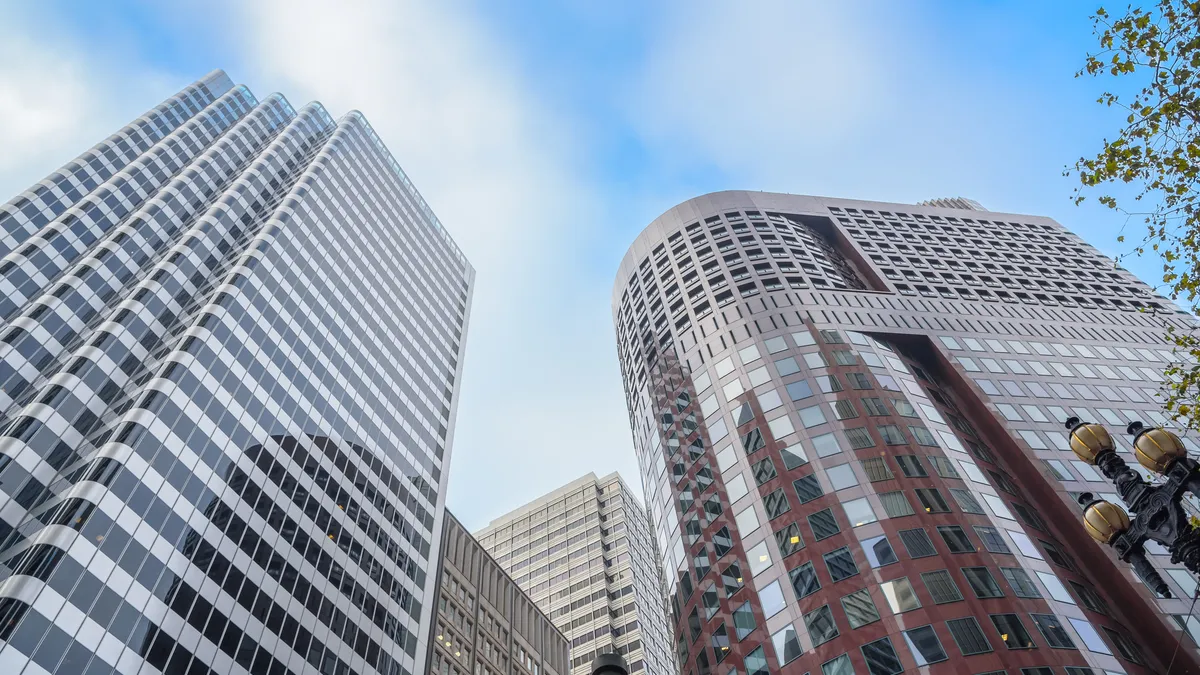 A view of several city high rise complexes and the skyline