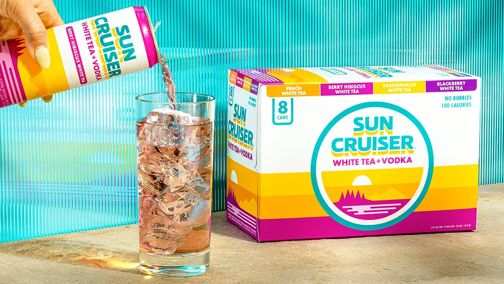 A Sun Cruiser is poured into a glass over ice.