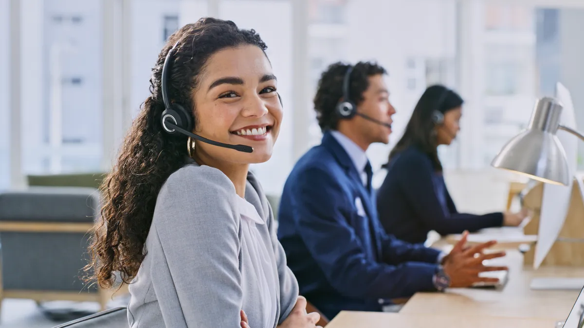 Smiling woman in work desk