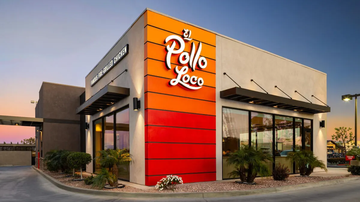 An angled image of a restaurant with signage that says El Pollo Loco