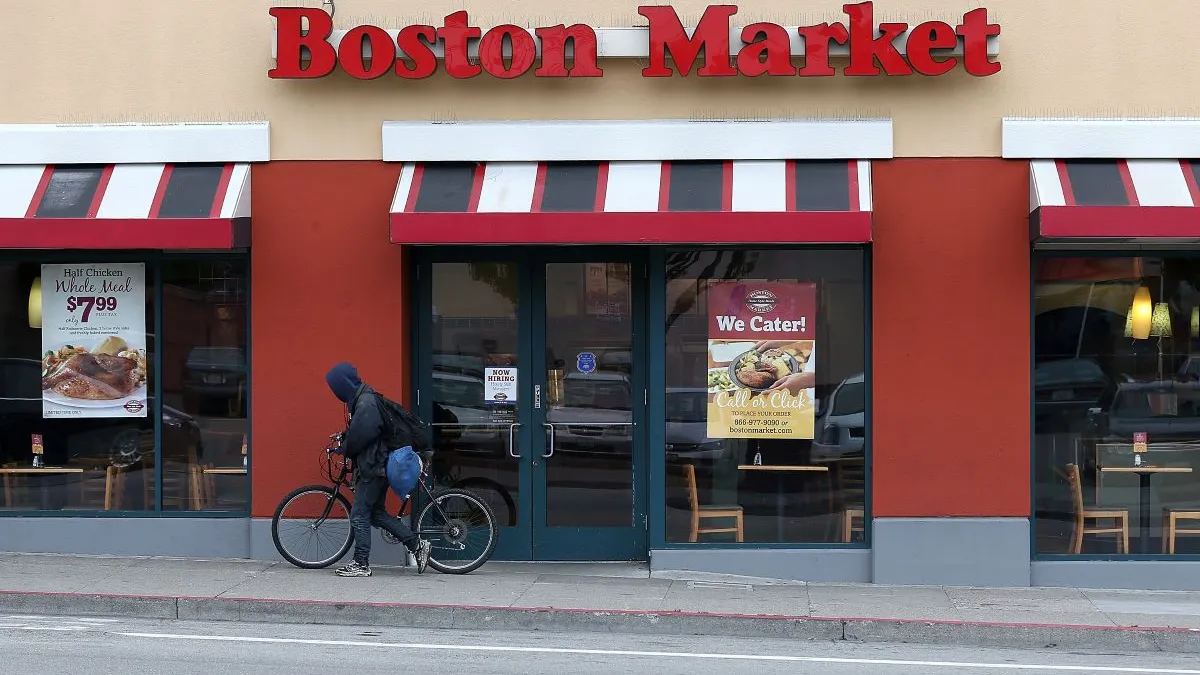 An image of a Boston Market restaurant with red and beige trim.