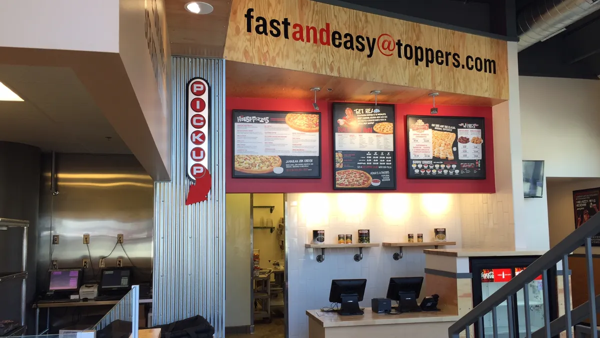 An image of the interior of Toppers Pizza