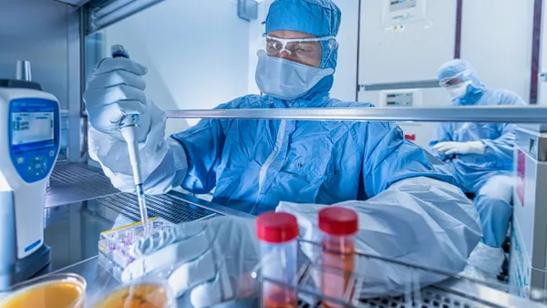 A scientist engaging in labratory work.