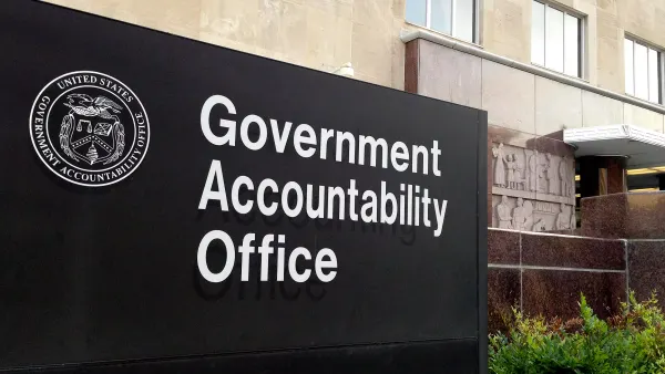 A sign that says "Government Accountability Office" and shows the GAO's seal sits in front of the agency's headquarters