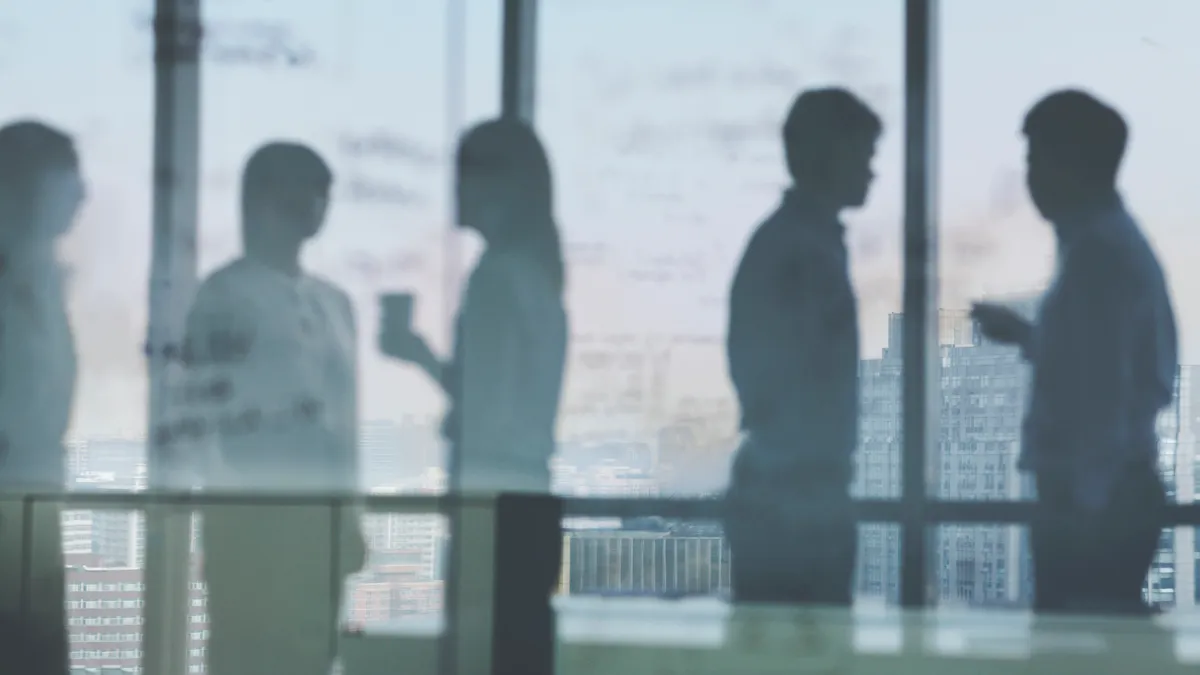 Silhouette shadows of business team meeting in office