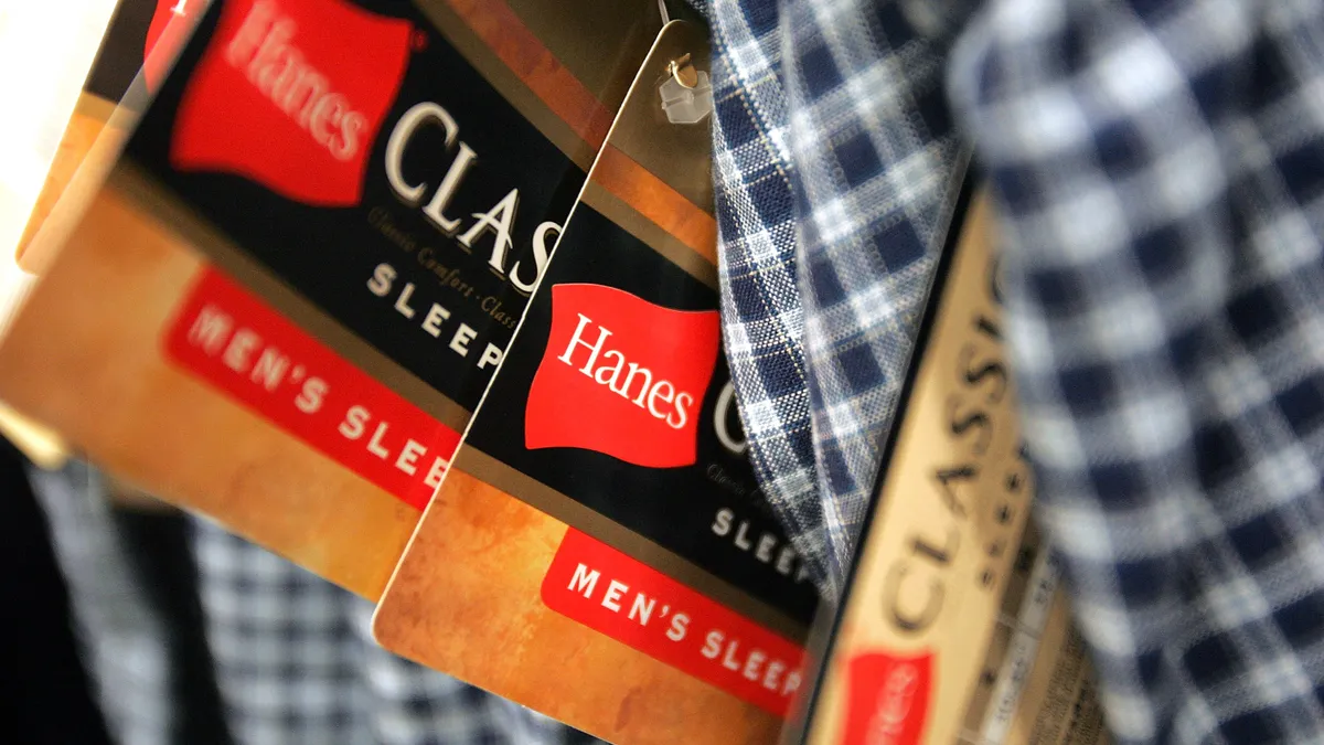 Tags on Hanes men's sleepwear items.