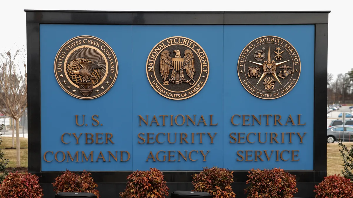 Seals of the U.S. Cyber Command, the National Security Agency and the Central Security Service.