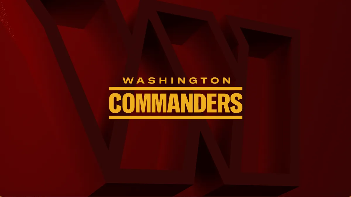 A maroon background with the golden letters "Washington Commanders."