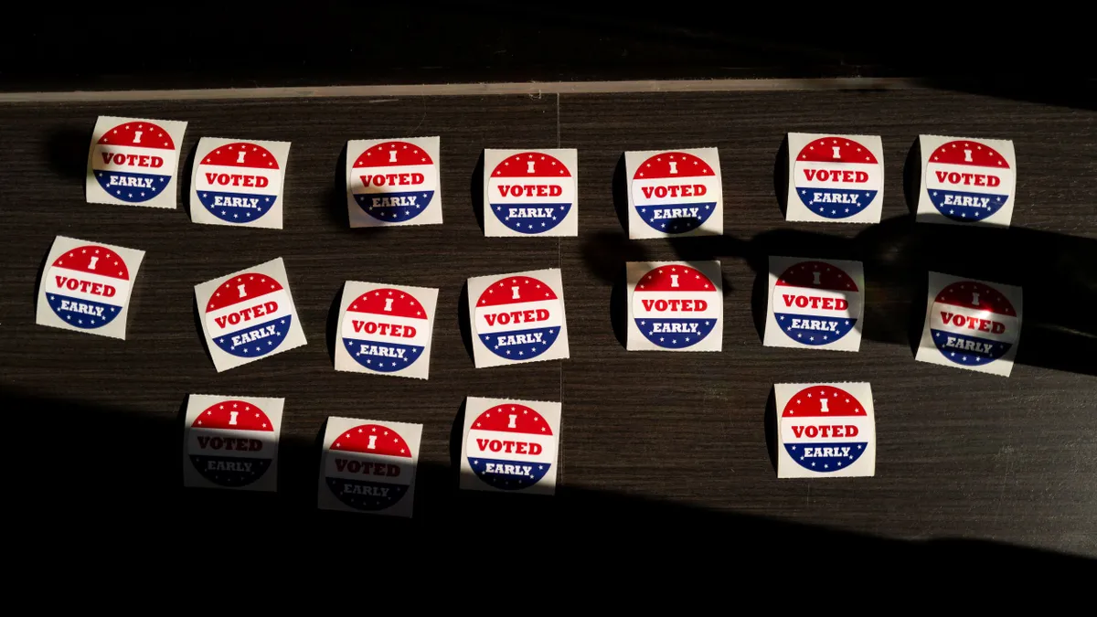 "I Voted Early" stickers sit on a table.