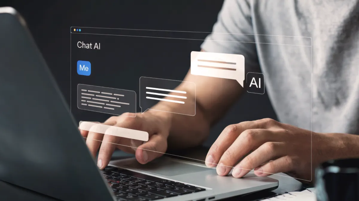 Hands typing on a laptop and AI chat bubbles floating around it