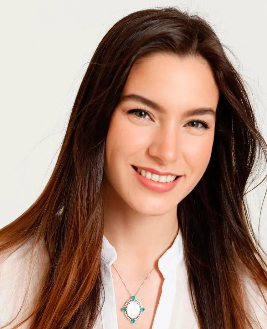 Headshot of a woman in business attire.