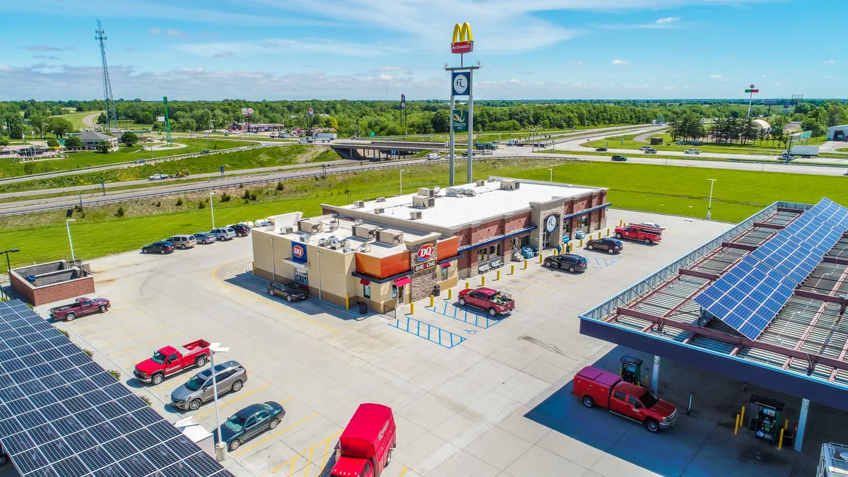 A photo of a FastLane convenience store and gas station.