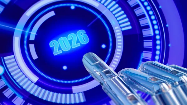 Closeup of robot finger pressing a 2026 button