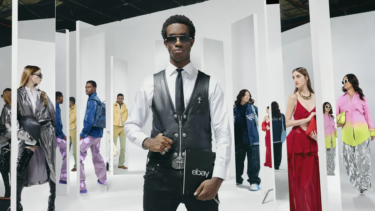 Models pose in a white room wiht multiple mirrors showcasing preowned items.