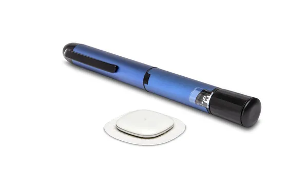 A white, rectangular sticker device is in front of a blue, pen-shaped device.