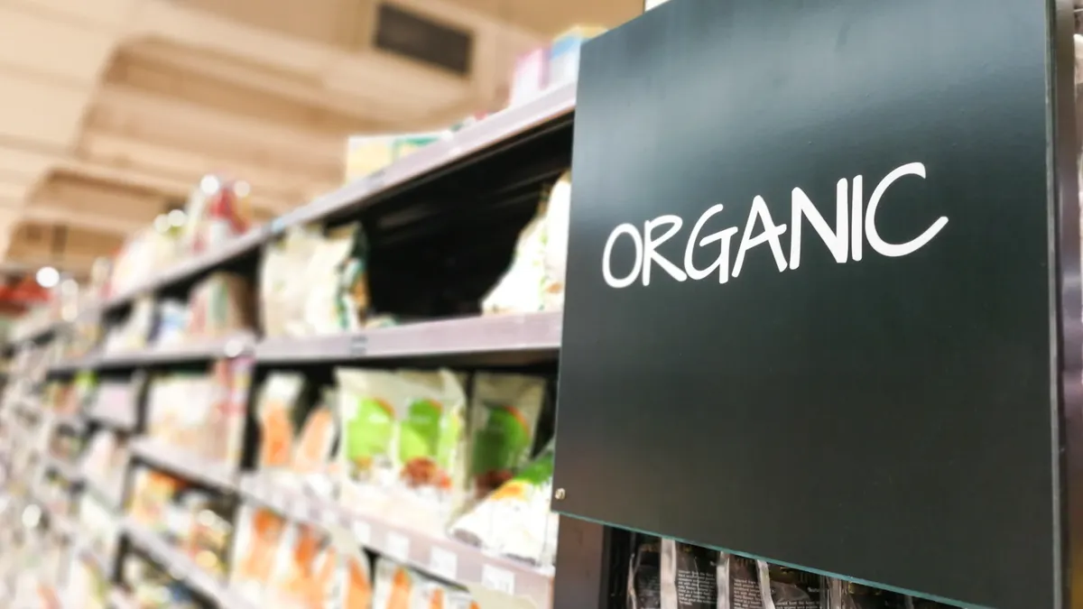 Organic products signage grocery category aisle at supermarket