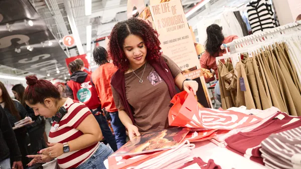Staff package Taylor Swift's new album, "Life of a Showgirl," at Target store.