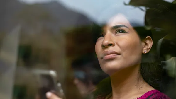 Woman staring out of the window