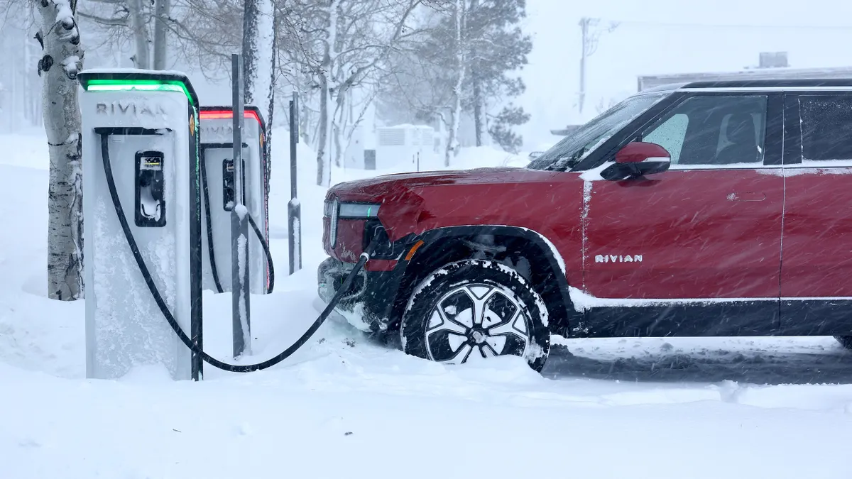 A Rivian truck recharges at a Rivian EV charging station on Mar. 3, 2024 in Truckee, California.