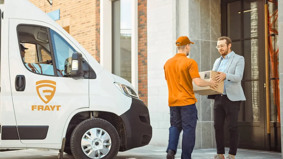 A driver for Frayt makes a delivery.