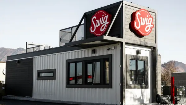 A Swig Dirty Soda location with a drive-thru.