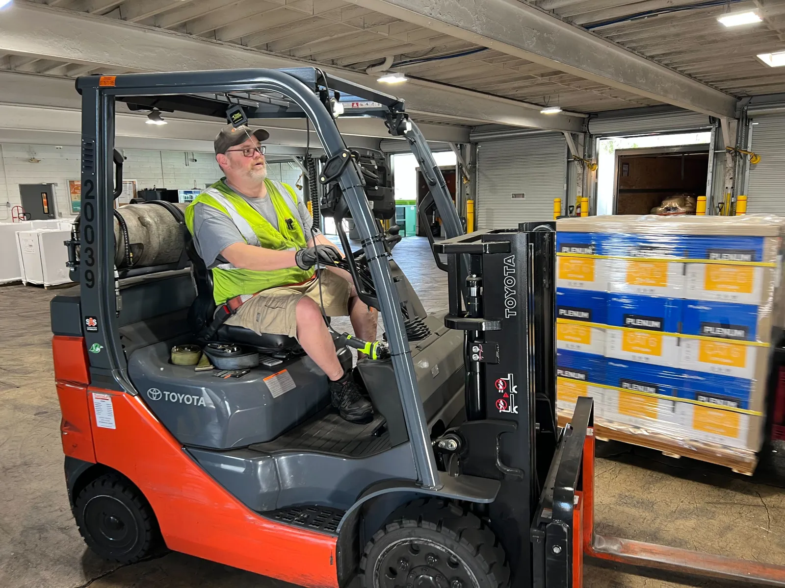 Matt Batchelder, an A. Duie Pyle dockworker, drives a forklift at the Richmond, Virginia terminal.